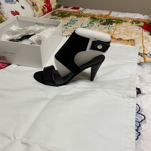 Nine West open-toed ankle boots.